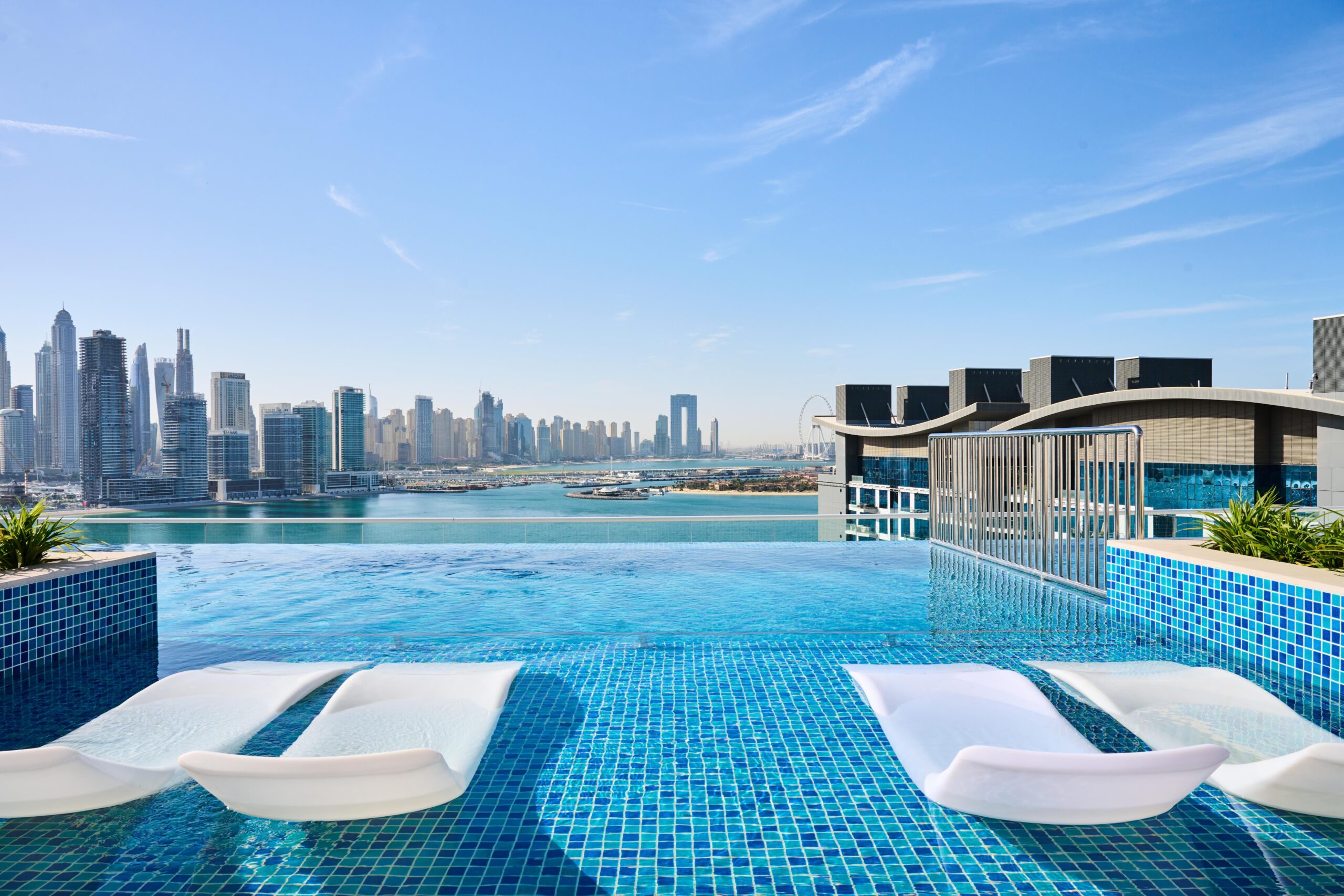 nh collection dubai the palm pool day 2 scaled