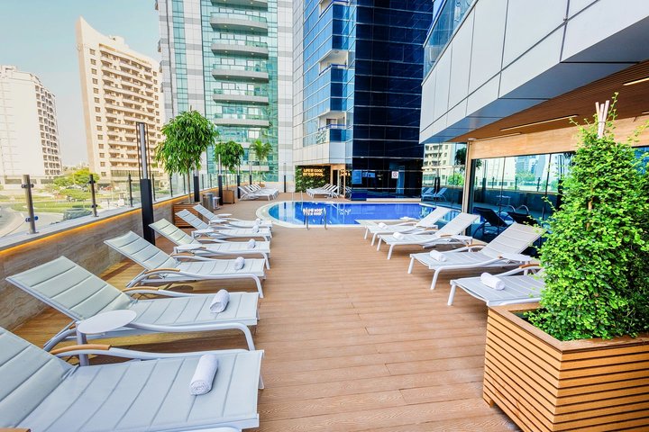 Golden Tulip Media Hotel v centru města s moderním ubytováním