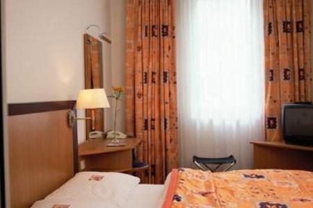 Stylový hotel NH Wien City Center v historické budově blízko zámku Belvedere.