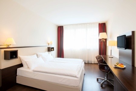 Stylový hotel NH Wien City Center v historické budově blízko zámku Belvedere.