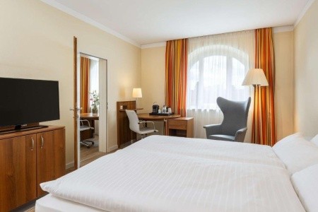 Stylový hotel NH Wien City Center v historické budově blízko zámku Belvedere.