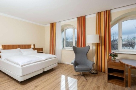 Stylový hotel NH Wien City Center v historické budově blízko zámku Belvedere.